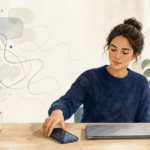 Watercolor illustration of a person setting down a phone beside a closed laptop